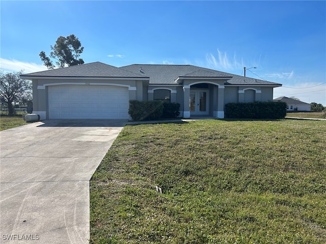 ranch-style home with a garage and a front lawn