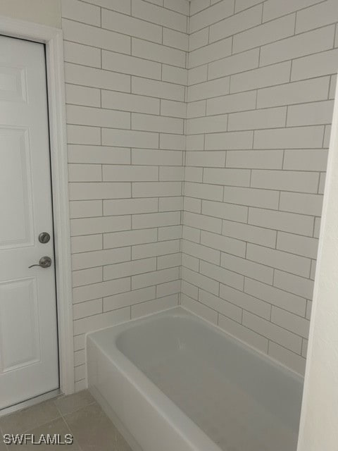 bathroom featuring tile patterned flooring