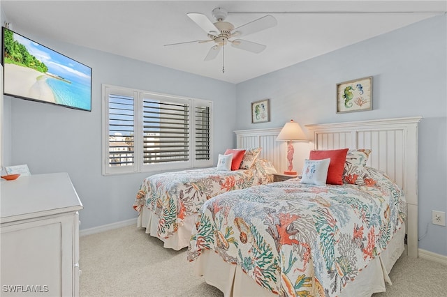 bedroom with light colored carpet and ceiling fan