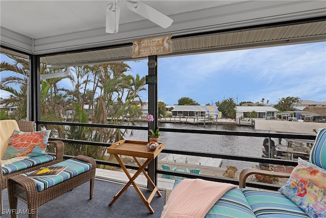 sunroom with a water view