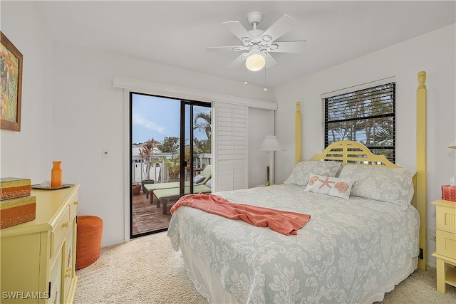 carpeted bedroom with access to outside and ceiling fan