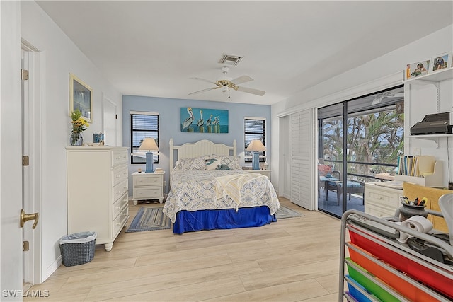 bedroom with ceiling fan, light wood-type flooring, and access to outside