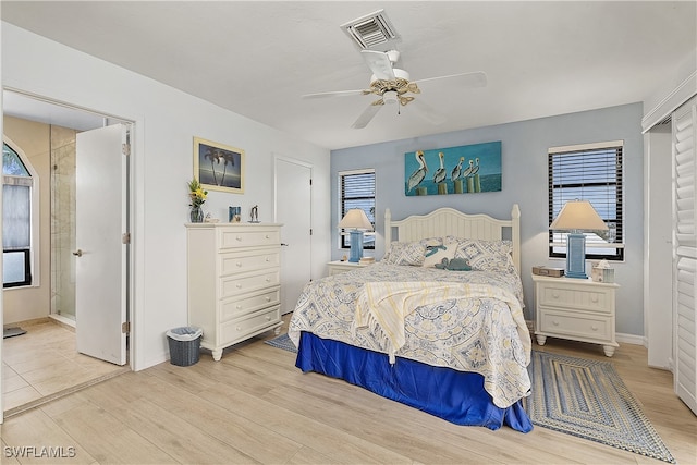 bedroom featuring light wood-type flooring and ceiling fan