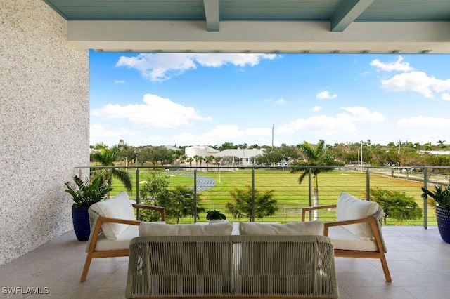 view of patio with a balcony