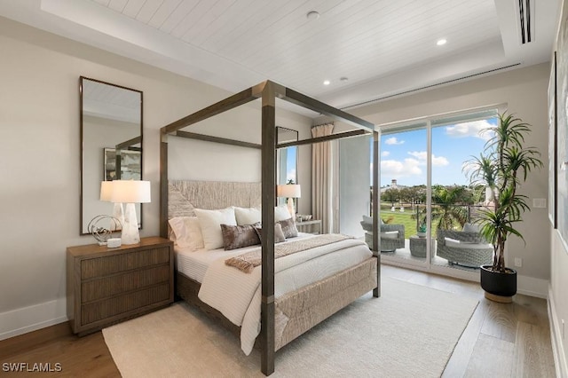 bedroom featuring wood-type flooring, access to outside, and wooden ceiling