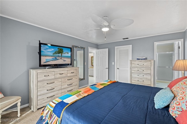 carpeted bedroom featuring a closet and ceiling fan