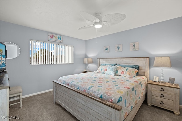 bedroom featuring ceiling fan and carpet