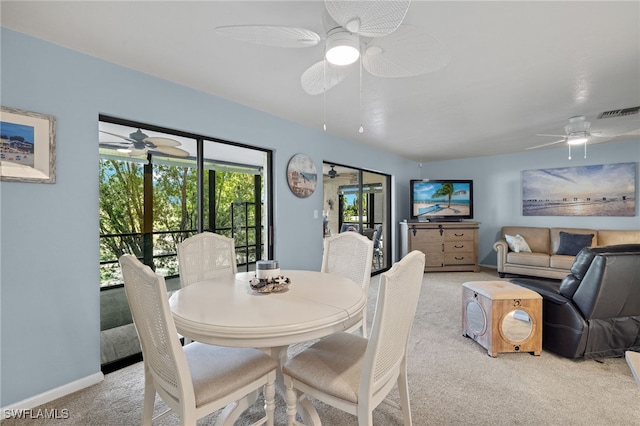 dining space with light colored carpet