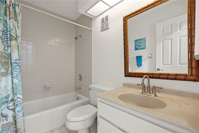 full bathroom featuring vanity, shower / tub combo, tile patterned flooring, and toilet