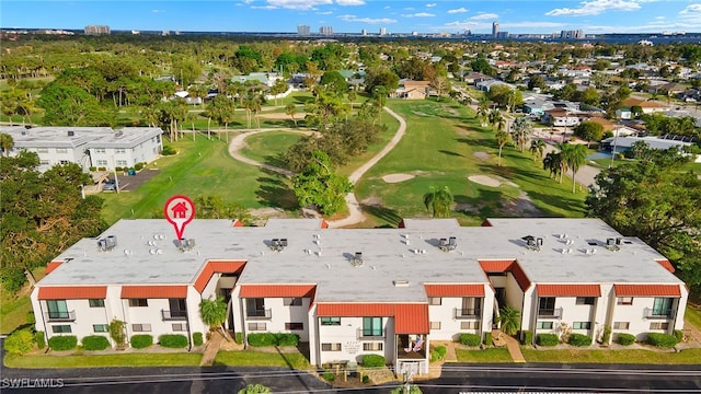4728 Orange Grove Blvd Unit 8, North Fort Myers, FL 33903 - aerial view of property's location with a golf course and nearby suburban area