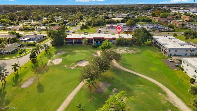 4728 Orange Grove Blvd Unit 8, North Fort Myers, FL 33903 - aerial perspective of suburban area with a golf club
