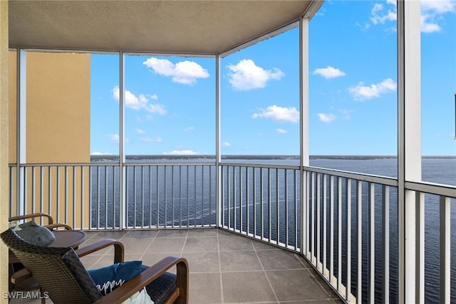 2745 1st St Unit 1906, Fort Myers, FL 33916 - unfurnished sunroom featuring a water view