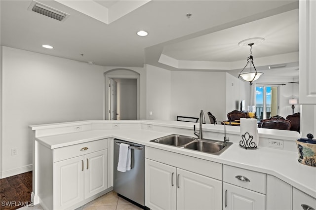 2745 1st St Unit 1906, Fort Myers, FL 33916 - kitchen featuring stainless steel dishwasher, a sink, white cabinetry, light countertops, and recessed lighting