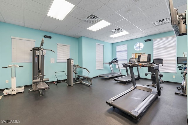 2745 1st St Unit 1906, Fort Myers, FL 33916 - workout area featuring a paneled ceiling and baseboards