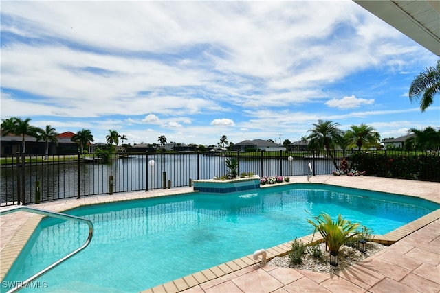 view of pool with a water view