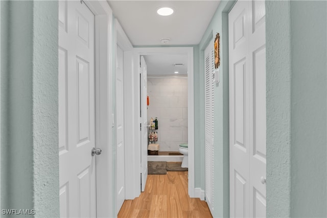 hallway featuring light hardwood / wood-style floors