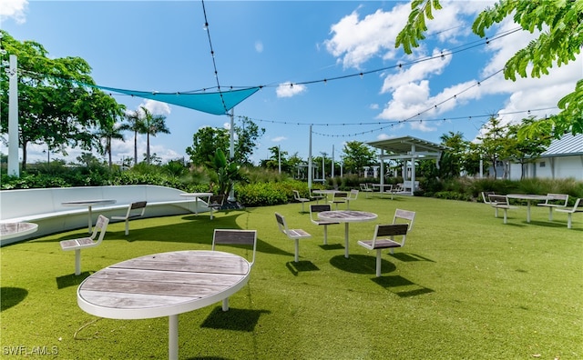 view of home's community with a gazebo and a yard