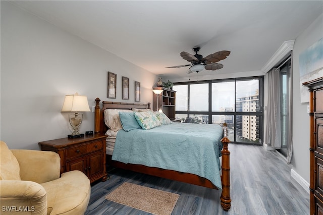 bedroom featuring dark hardwood / wood-style flooring and ceiling fan