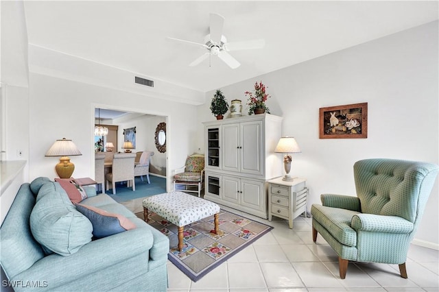 8410 Abbington Cir Unit A22, Naples, FL 34108 - living room with light tile patterned floors, a chandelier, and ceiling fan