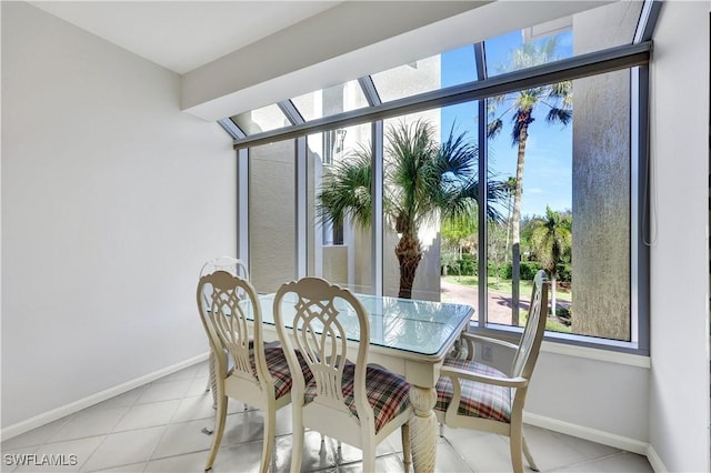 8410 Abbington Cir Unit A22, Naples, FL 34108 - dining space featuring healthy amount of natural light and baseboards