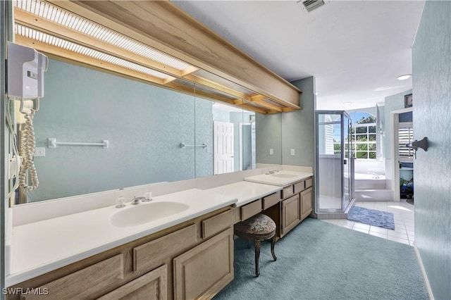 8410 Abbington Cir Unit A22, Naples, FL 34108 - full bath featuring double vanity, a bath, and tile patterned floors
