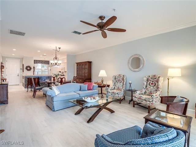 20011 Sanibel View Cir # 203, Fort Myers, FL 33908 - living area with ceiling fan, crown molding, a chandelier, light wood-style floors, and baseboards