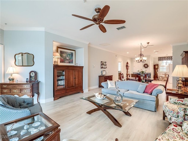 20011 Sanibel View Cir # 203, Fort Myers, FL 33908 - living area featuring a ceiling fan, light wood-style flooring, a chandelier, baseboards, and ornamental molding