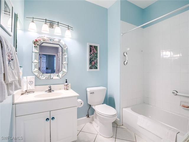 full bathroom featuring toilet, tiled shower / bath, tile patterned floors, and vanity