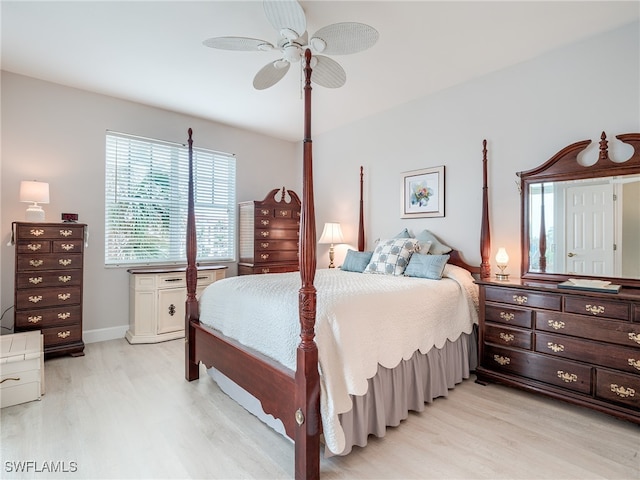 bedroom with light hardwood / wood-style flooring and ceiling fan