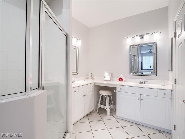 20011 Sanibel View Cir # 203, Fort Myers, FL 33908 - bathroom featuring a stall shower, vanity, and tile patterned flooring