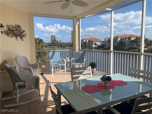 20011 Sanibel View Cir # 203, Fort Myers, FL 33908 - sunroom / solarium featuring outdoor dining area, ceiling fan, floor to ceiling windows, and healthy amount of natural light