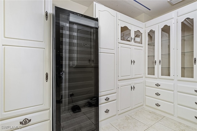 interior space featuring light tile patterned floors