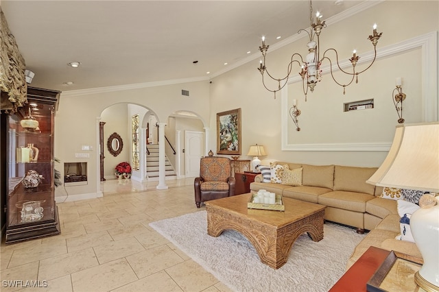 living room featuring a notable chandelier and ornamental molding