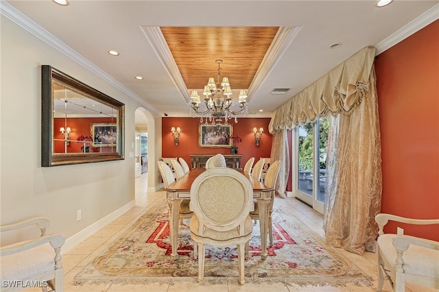 dining area with a raised ceiling, wood ceiling, crown molding, and a chandelier