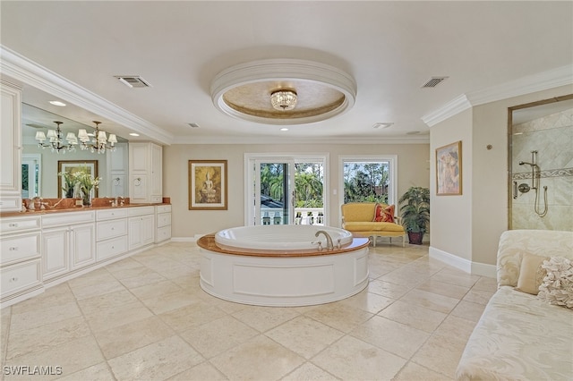 bathroom featuring ornamental molding, vanity, a tray ceiling, tile patterned flooring, and shower with separate bathtub