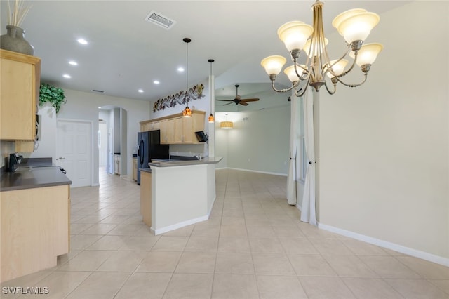 kitchen with pendant lighting, stove, black fridge with ice dispenser, light brown cabinetry, and ceiling fan with notable chandelier