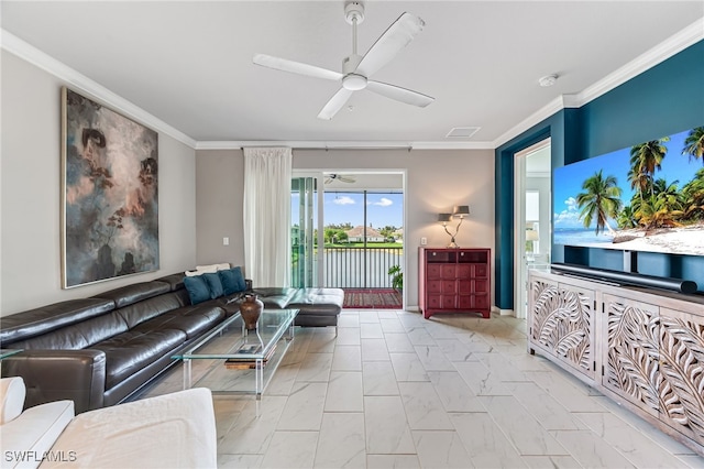 living room with ceiling fan and ornamental molding