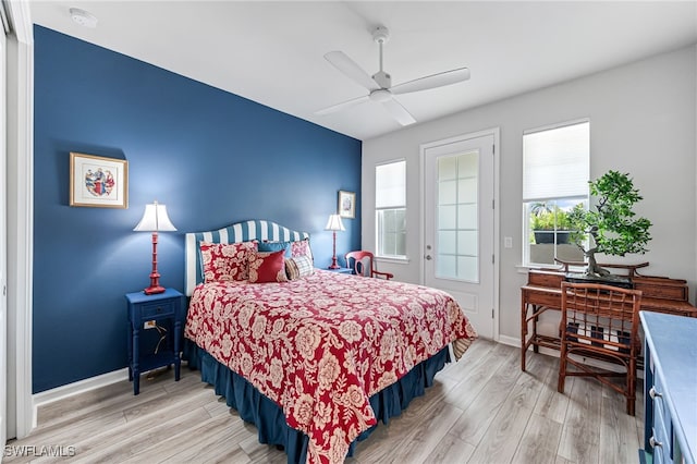 4705 Arboretum Cir Unit 202, Naples, FL 34112 - bedroom with light wood-type flooring and ceiling fan