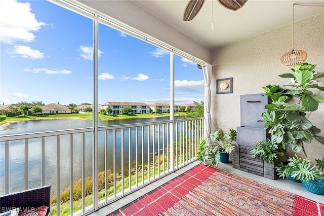 4705 Arboretum Cir Unit 202, Naples, FL 34112 - sunroom / solarium featuring a water view