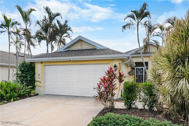 ranch-style home with a garage