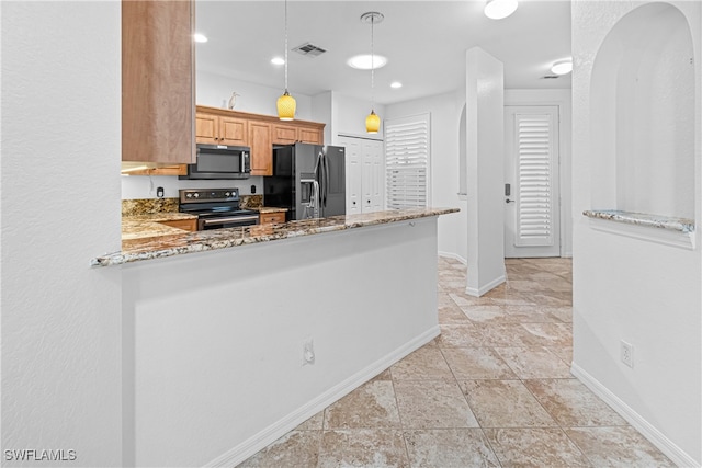 kitchen with stainless steel appliances, kitchen peninsula, pendant lighting, and light stone counters