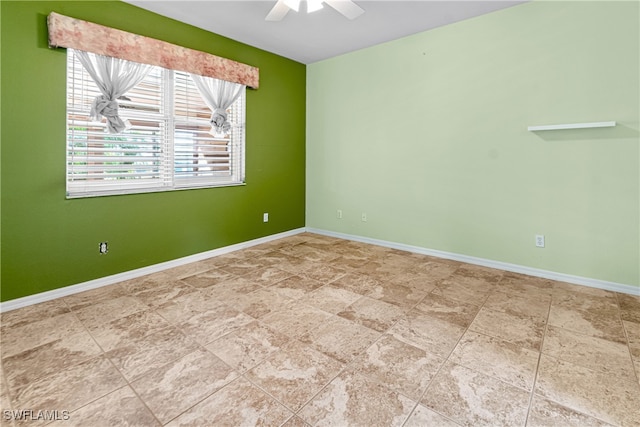 unfurnished room with ceiling fan