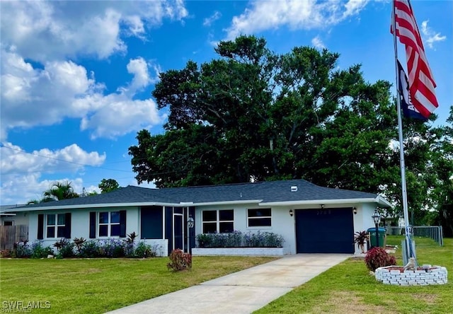 ranch-style home with a garage and a front yard