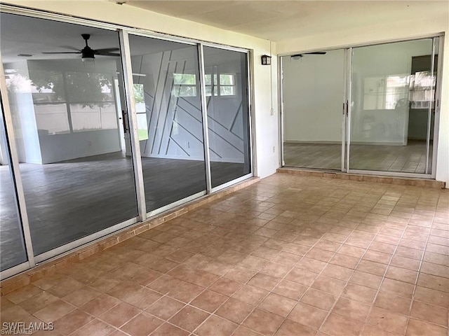 empty room featuring ceiling fan