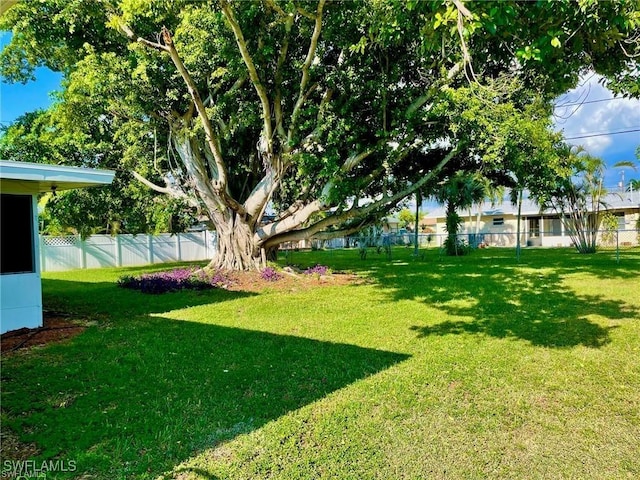 view of yard featuring fence