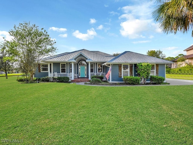 ranch-style house with a porch and a front lawn