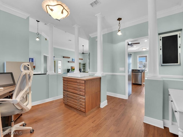 kitchen with light hardwood / wood-style floors, stainless steel dishwasher, and ornamental molding