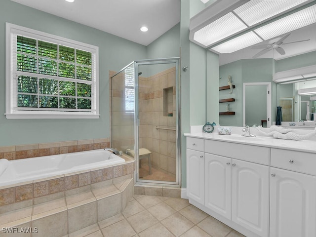 bathroom featuring vanity, separate shower and tub, tile patterned floors, and ceiling fan