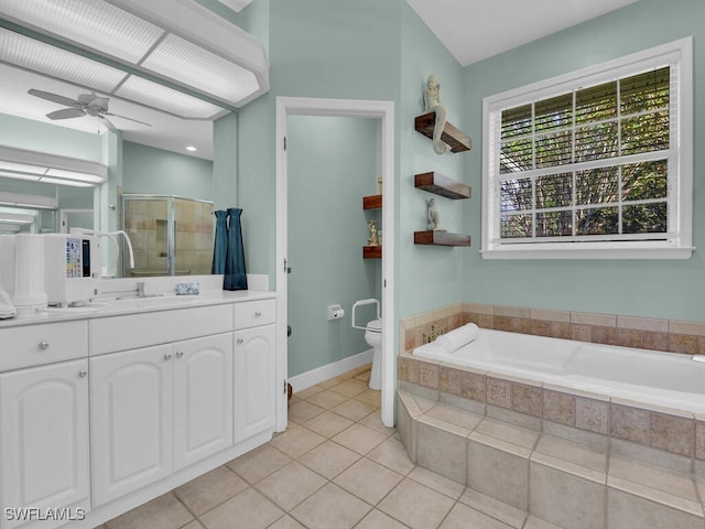 full bathroom with vanity, plus walk in shower, tile patterned floors, ceiling fan, and toilet