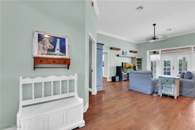 living room featuring french doors, hardwood / wood-style flooring, ceiling fan, and ornamental molding